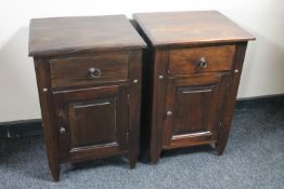A pair of mahogany bedside cabinets fitted a drawer