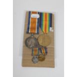 Two WWI medals, Victory Medal and British War Medal on ribbons with accompanying miniatures,