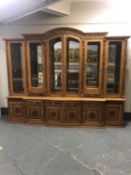 An impressive oriental style high gloss glazed, breakfront bookcase,