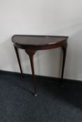 A D-shaped hall table