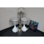 A large stainless steel and glass hurricane lamp by The White Company, glass vase and candle,