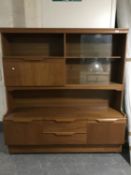 A late 20th century teak wall unit