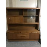 A late 20th century teak wall unit