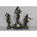An antique French spelter and onyx figural clock garniture