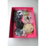 A box of fly fishing reel and line and fishing flies