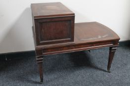 A reproduction telephone table