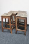 A set of four pine farmhouse kitchen stools