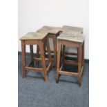 A set of four pine farmhouse kitchen stools