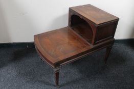 A reproduction telephone table