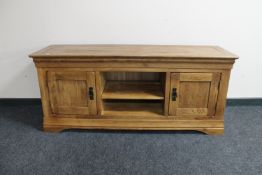 A contemporary oak entertainment unit