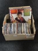 A box of LP records and 7" singles - 80's,