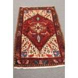 A Heriz rug,