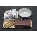 A tray of brass crumb scoop, leather cased travel set,