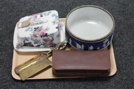 A tray of brass crumb scoop, leather cased travel set,