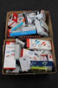 Two boxes of unofficial Nintendo accessories, telephone, start packs,