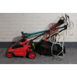 An Estore London electric self drive lawn mower with grass box and lead,