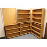 Five sets of teak effect open shelves