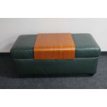 A Ekornes storage green leather double footstool with beech table insert