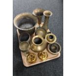 A tray of assorted brass ware to include Eastern brass planter and vases, pair of candlesticks,