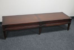 A mahogany rectangular coffee table