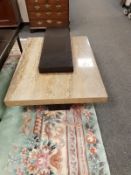 A contemporary granite coffee table,