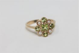 A 9ct gold peridot and pearl ring