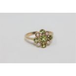 A 9ct gold peridot and pearl ring