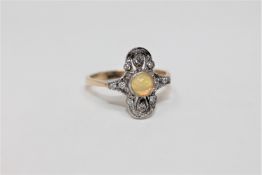 An 18ct gold opal and diamond ring