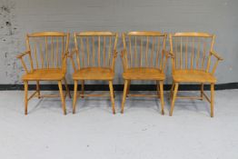 A set of four ash spindle back armchairs