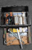 A box and crate of ladder clamps, fuse box fuses, socket connector,