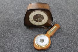 An oak cased Smiths mantel clock and a barometer