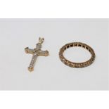 A 9ct gold synthetic spinel eternity ring and a 9ct gold crucifix pendant CONDITION