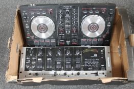 A box of New Mark control desk together with a pioneer DJ mixer