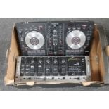 A box of New Mark control desk together with a pioneer DJ mixer