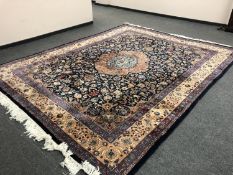 A Kachmar carpet, on blue ground,