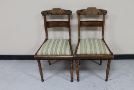 A pair of continental mahogany dining chairs