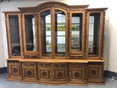 An impressive oriental style high gloss glazed, breakfront bookcase,