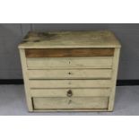 An antique pine six drawer painted chest