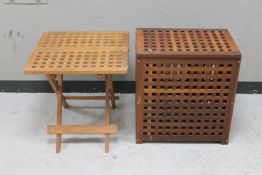 A teak storage box and a teak folding garden table