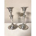 A pair of silver candlesticks, Sheffield 1911,