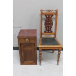 An antique mahogany dining chair and a pot cupboard