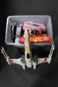 A Star Wars X-Wing together with a box containing assorted children's toys including 24 DVD board