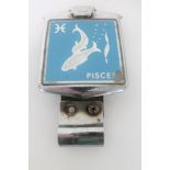 A vintage 'Pisces' car badge