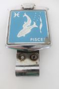 A vintage 'Pisces' car badge