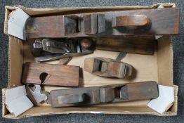 A box of seven assorted woodworking planes