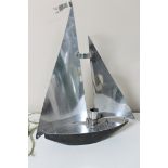 An Art Deco chrome table lamp in the form of a yacht