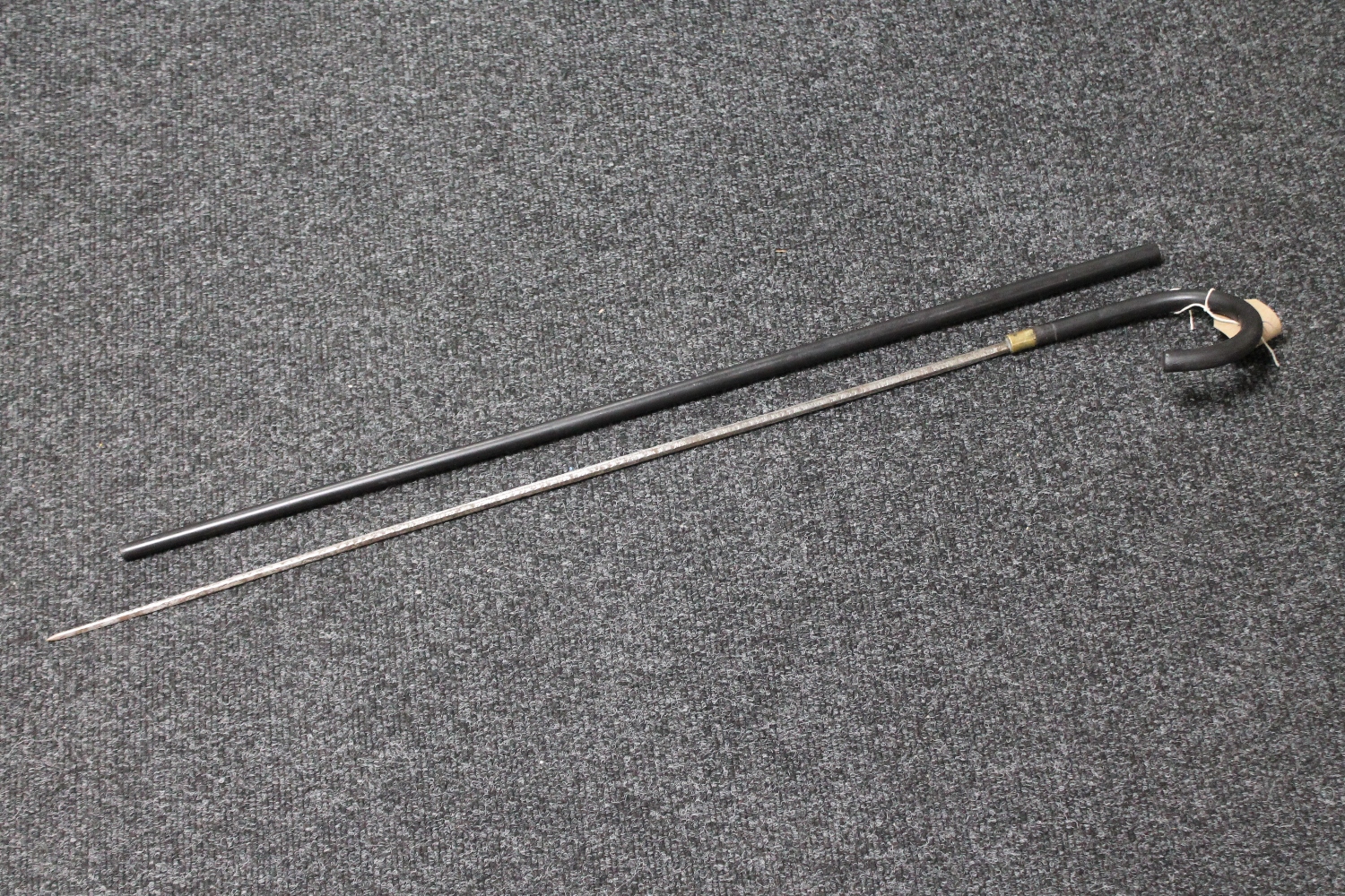 An antique metal cased sword stick CONDITION REPORT: Overall length 81cm.
