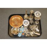 A tray of silver plated items, cruet set, tea spoons, silvered metal and copper plaques etc.