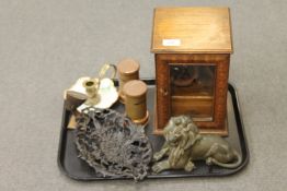 A tray of oak smokers cabinet, cast metal lion figure, Victorian metal dish etc.