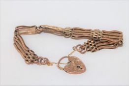 A 9ct gold padlock bracelet CONDITION REPORT: 15.